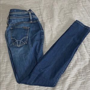 Bebe Size 27 Mid-rise Skinny Jeans